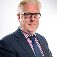Guy Emmerson head shot Bruton Knowles