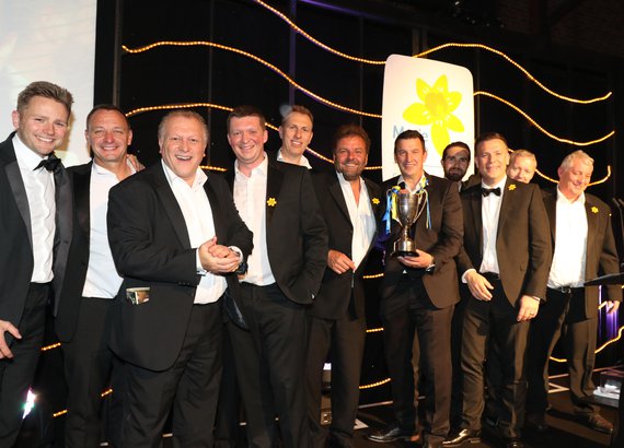 The Knight Group celebrate victory with Martin Roberts