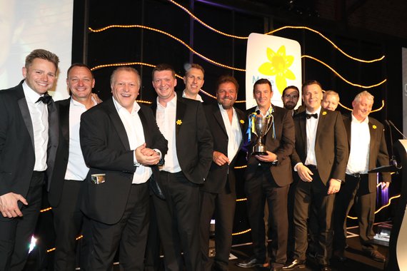 The Knight Group celebrate victory with Martin Roberts