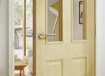 Premdor introduces oak factory glazed fire doors